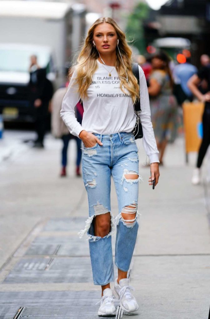 Romee Strijd in a Blue Ripped Jeans