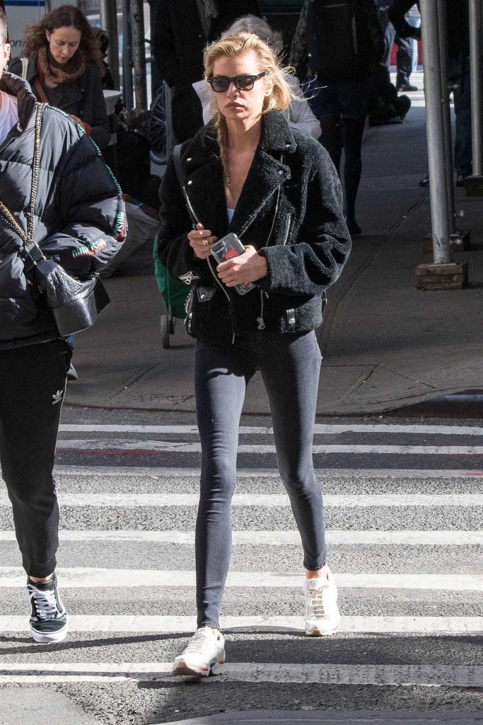 Stella Maxwell in a Short Black Synthetic Fur Jacket