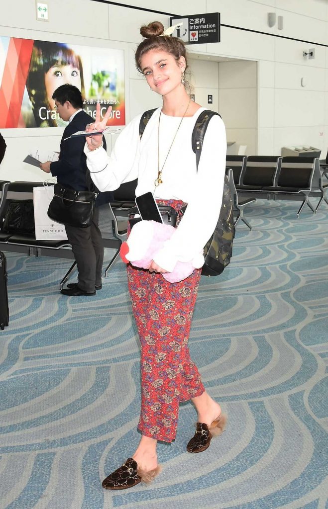 Taylor Hill in a Red Floral Pants