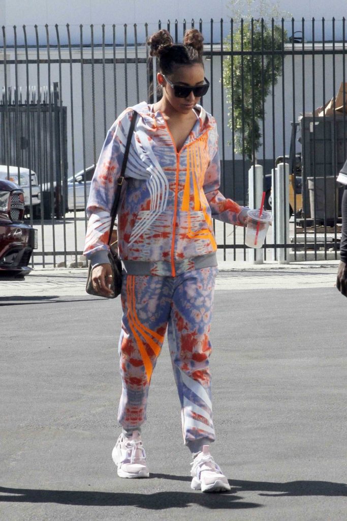 Tinashe with a Gucci Bag