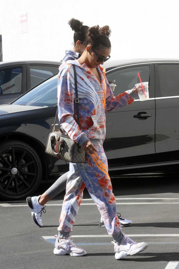 Tinashe with a Gucci Bag