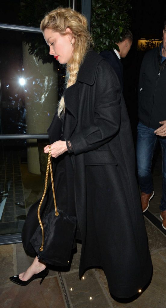 Amber Heard in a Black Coat