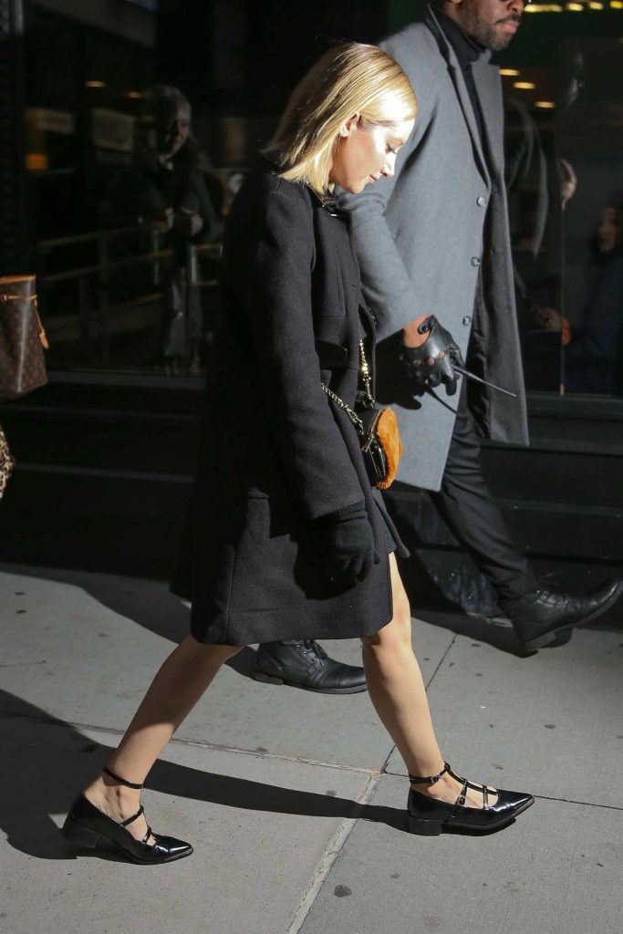 Ashley Tisdale in a Black Coat