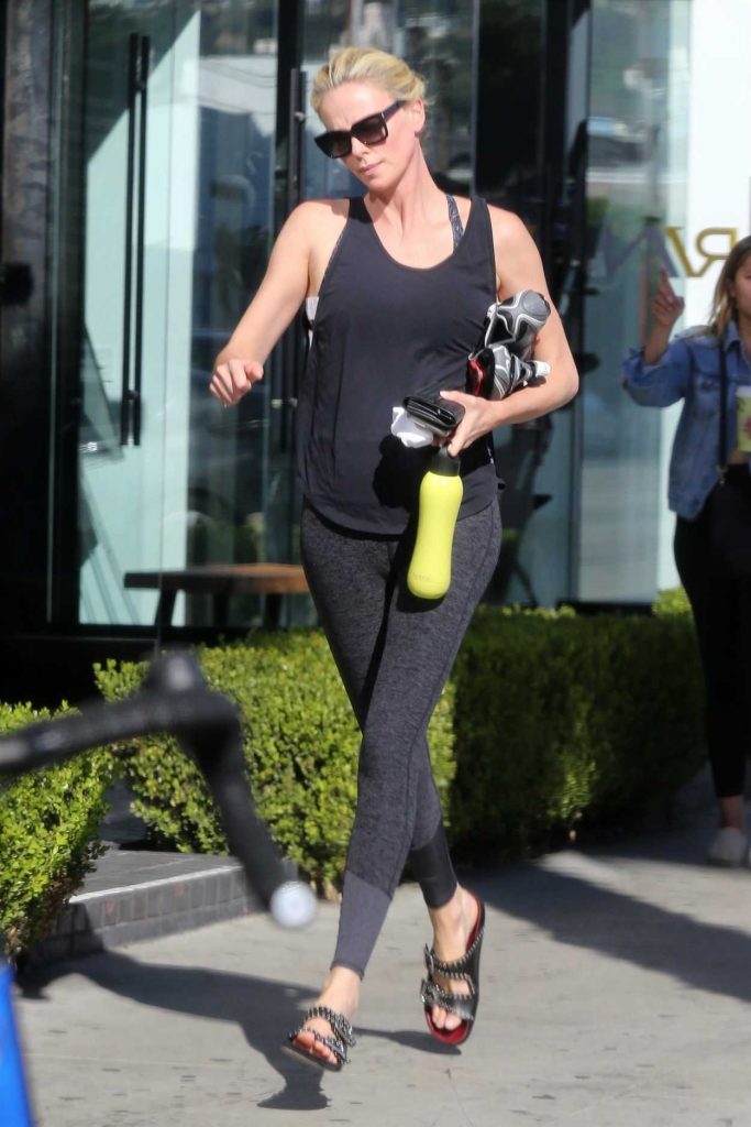Charlize Theron in a Black Tank Top