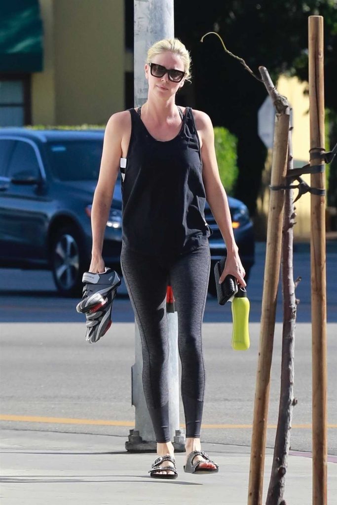 Charlize Theron in a Black Tank Top