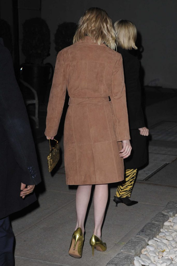 Emma Roberts in a Beige Trench Coat