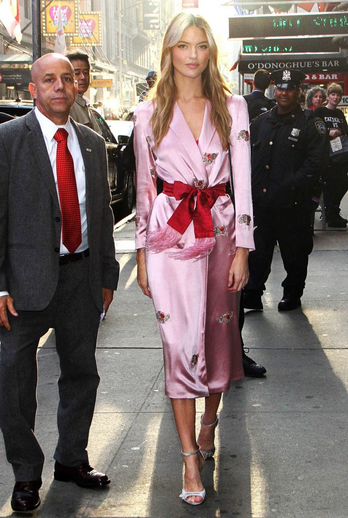 Martha Hunt in a Long Pink Wrap Dress