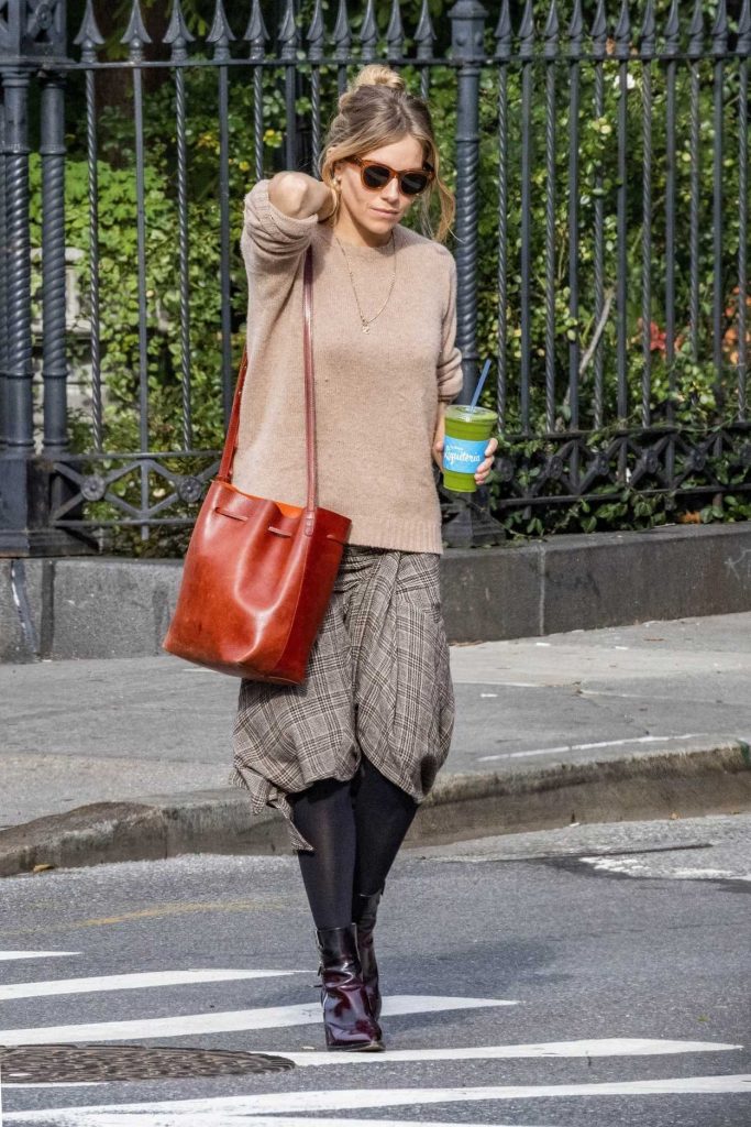Sienna Miller in a Beige Sweater