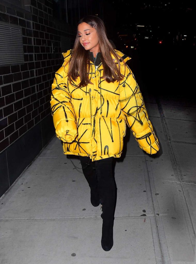 Ariana Grande in a Yellow Oversized Puffer Jacket