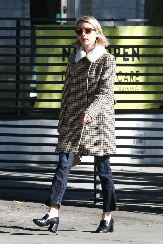 Emma Roberts in a Beige Plaid Coat