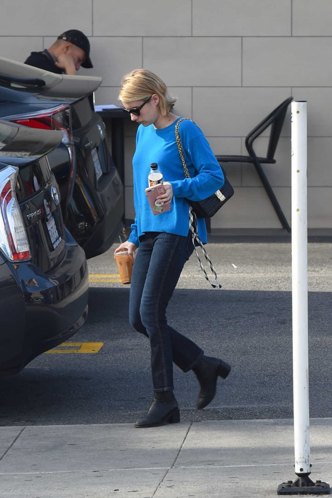 Emma Roberts in a Blue Sweatshirt