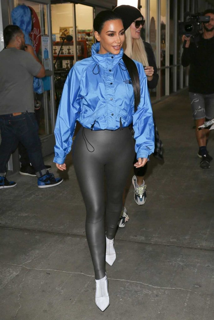 Kim Kardashian in a Light Blue Windbreaker