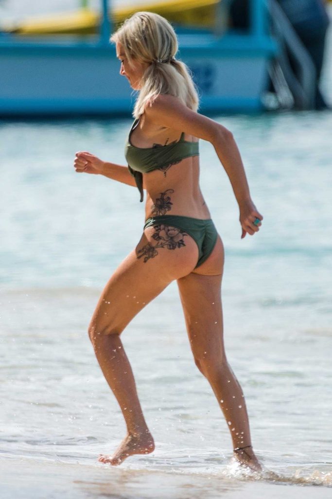 Laura Anderson in a Green Bikini