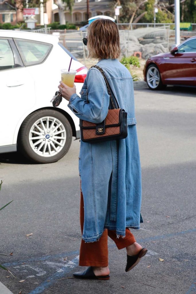 Lucy Hale in a Blue Denim Trench Coat
