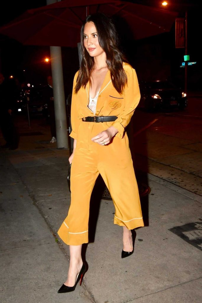 Olivia Munn in a Yellow Overalls