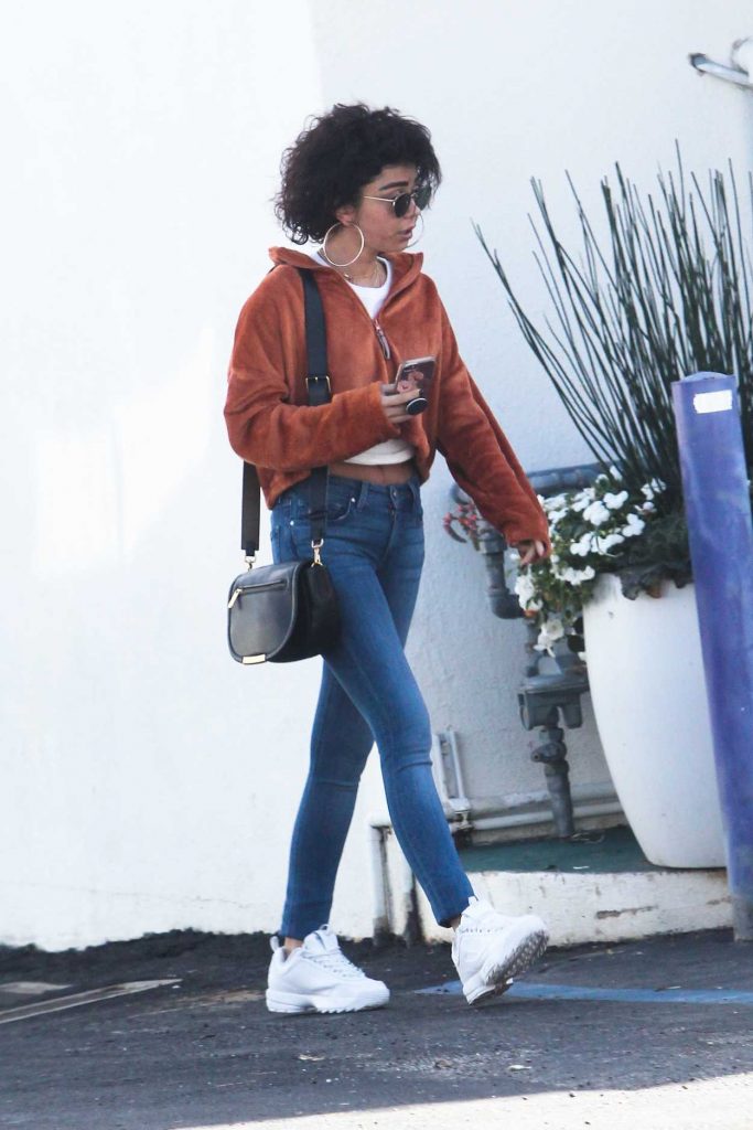 Sarah Hyland in a White Sneakers