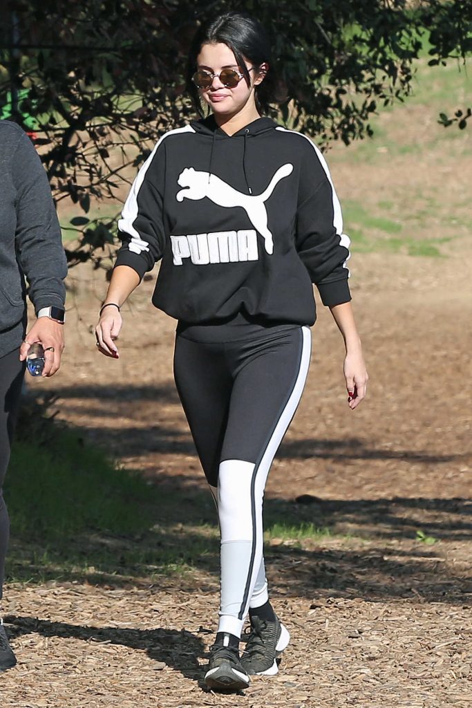 Selena Gomez in a Black Puma Jogging Suit