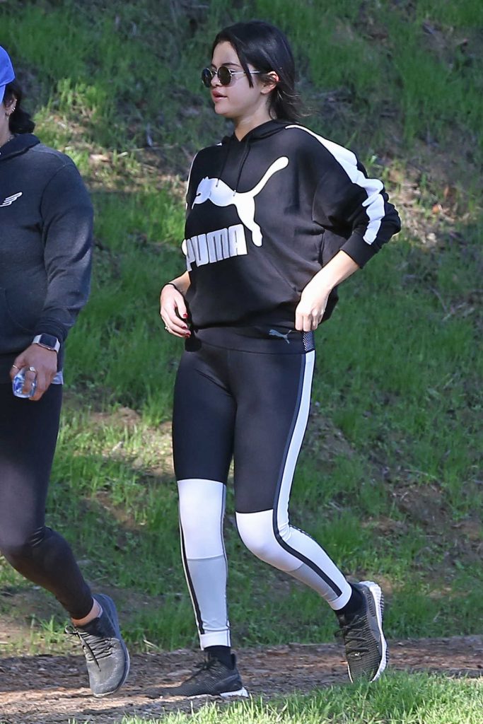 Selena Gomez in a Black Puma Jogging Suit