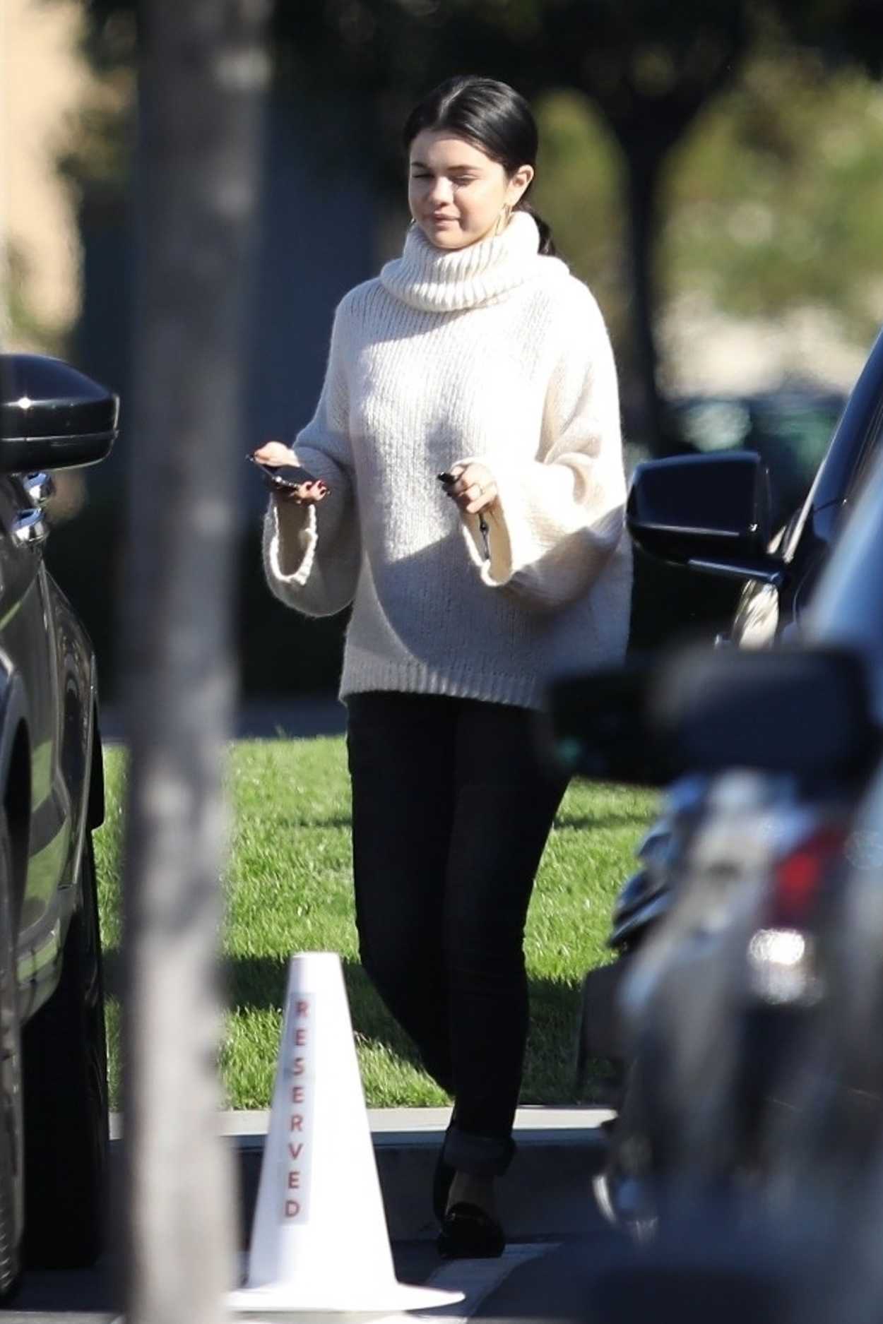 Selena Gomez in a White Sweater Attends Sunday Church Services Ahead of ...
