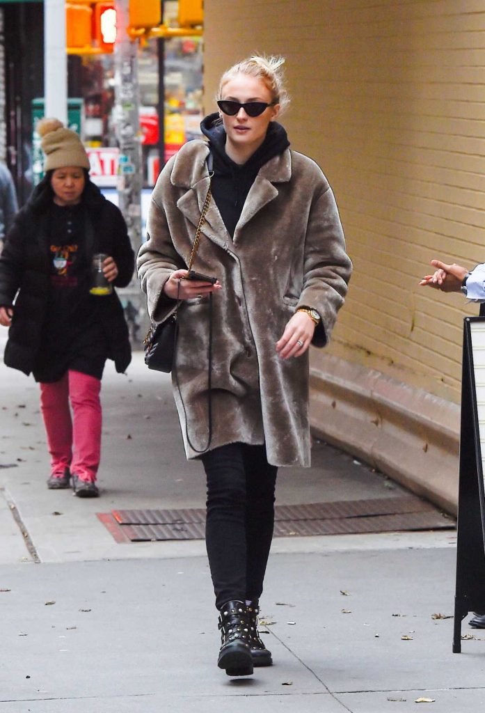 Sophie Turner in a Beige Fur Coat