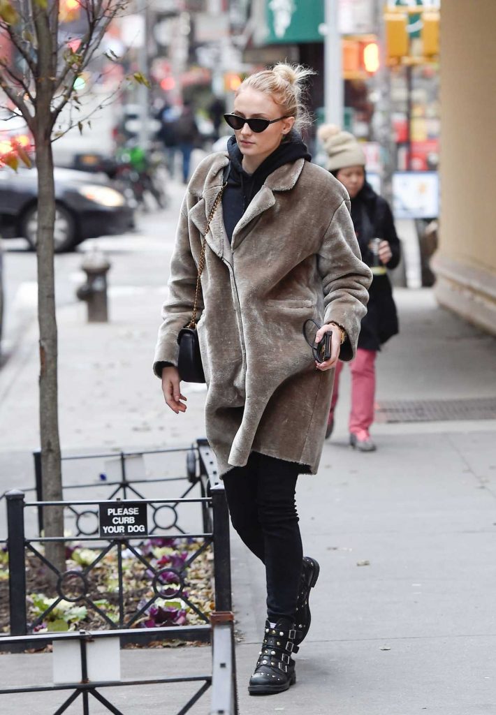 Sophie Turner in a Beige Fur Coat