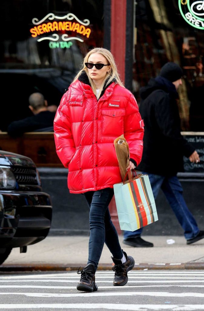 Sophie Turner in a Red Puffy Coat