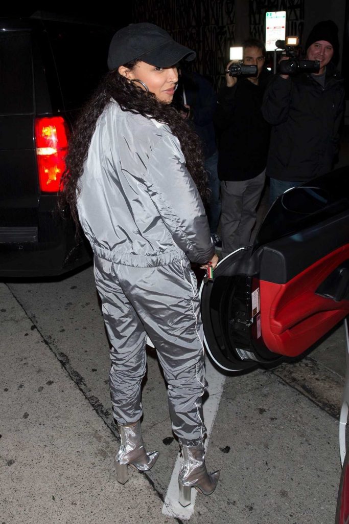 Tinashe in a Gray Shiny Tracksuit