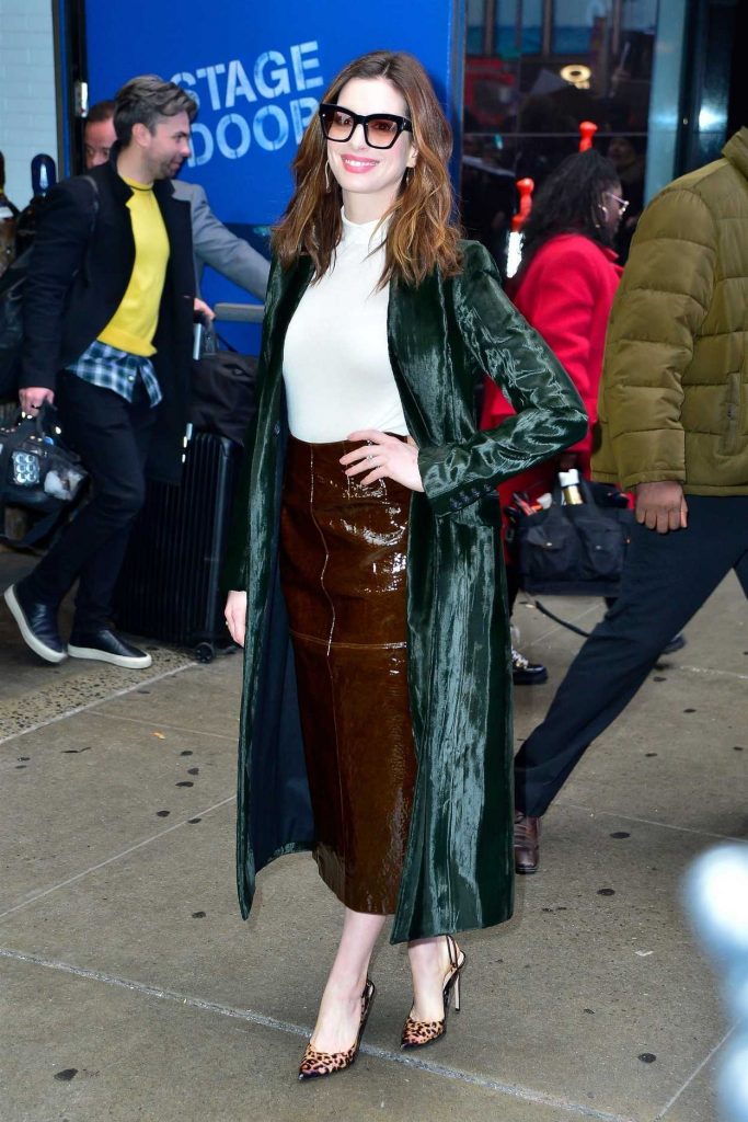 Anne Hathaway in a Green Trench Coat
