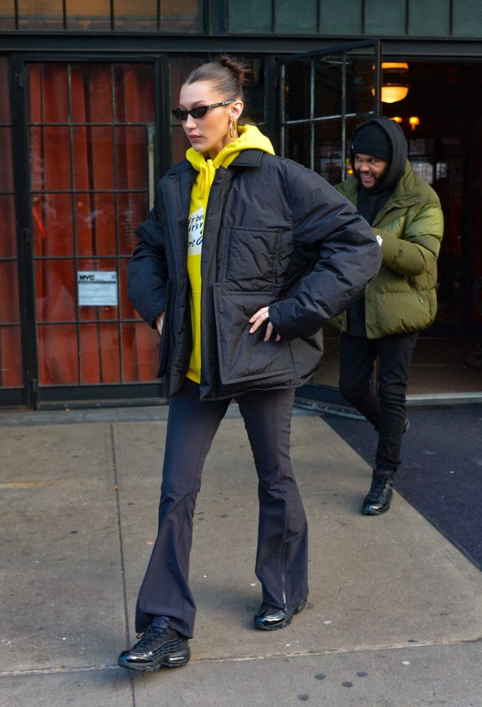Bella Hadid in a Yellow Hoody