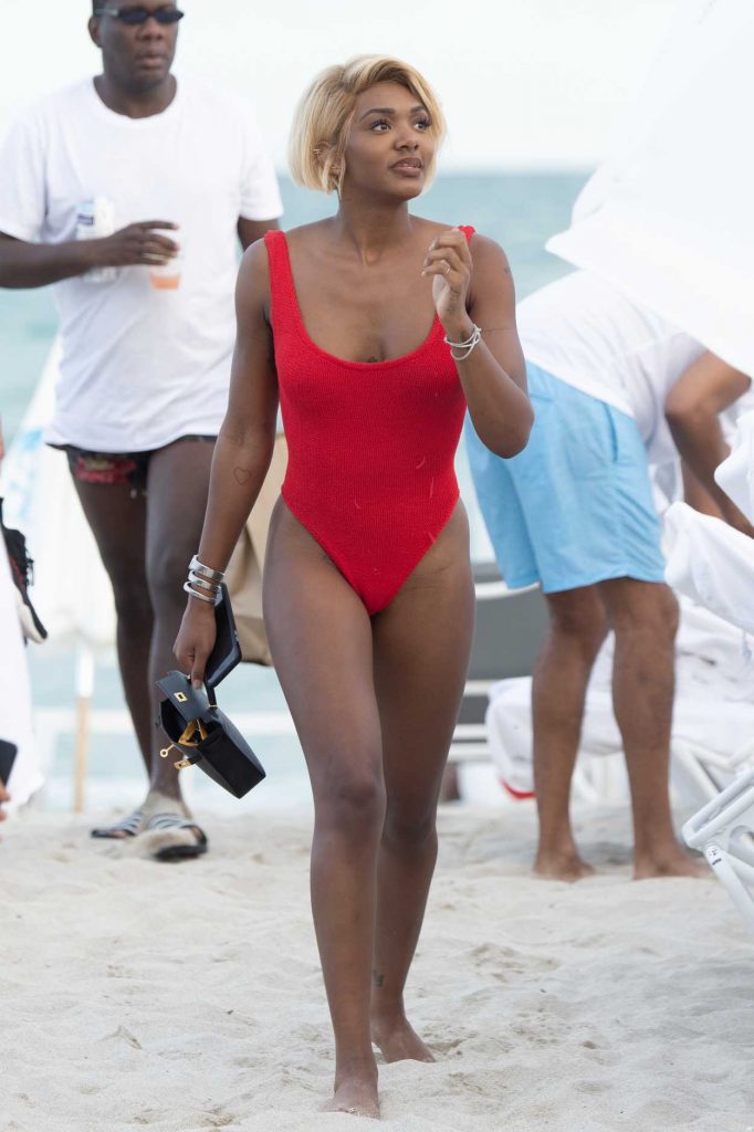 Elisa Johnson in a Red Swimsuit