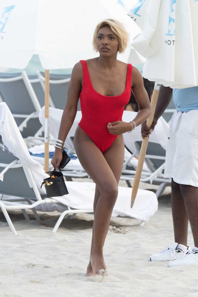 Elisa Johnson in a Red Swimsuit