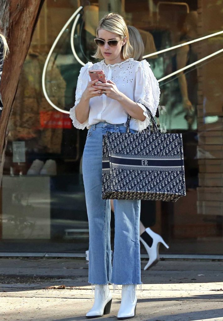 Emma Roberts in a White Blouse