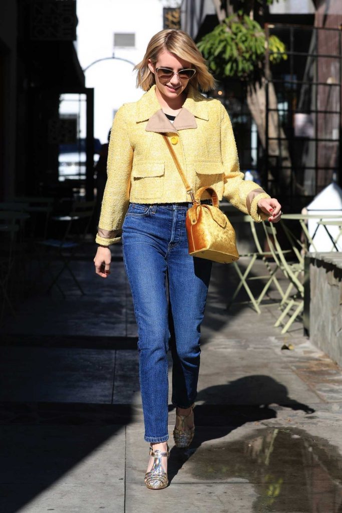 Emma Roberts in a Yellow Jacket
