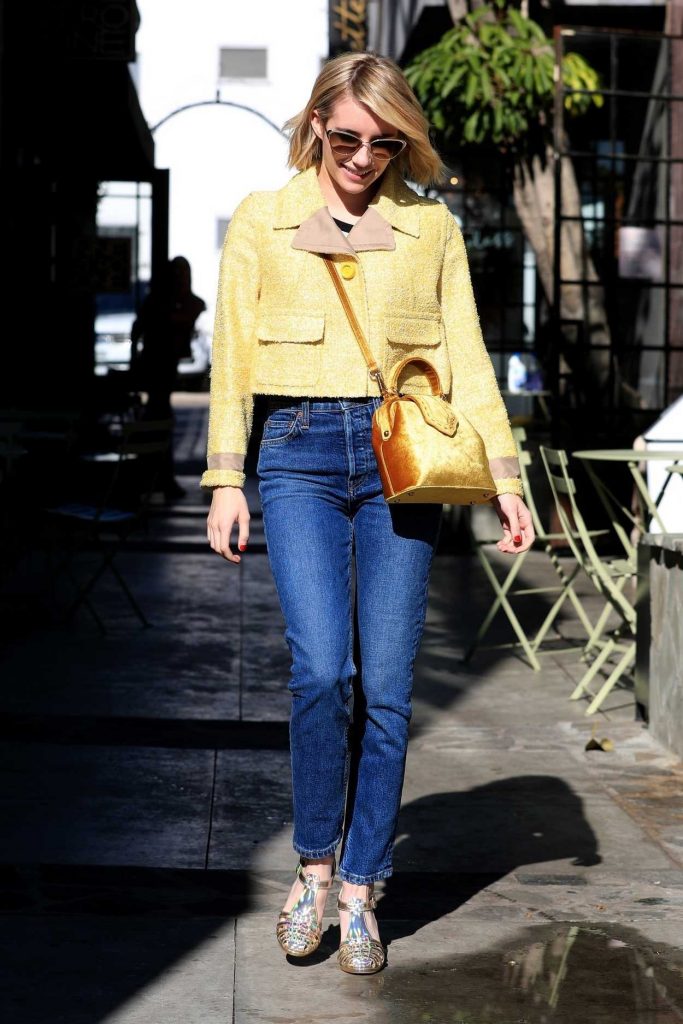 Emma Roberts in a Yellow Jacket