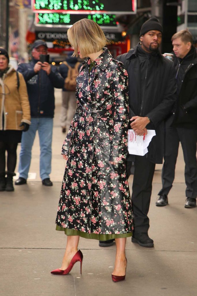 Sarah Paulson in a Black Floral Trench Coat