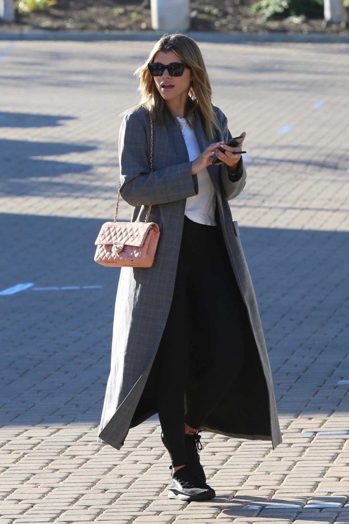 Sofia Richie in a Gray Trench Coat