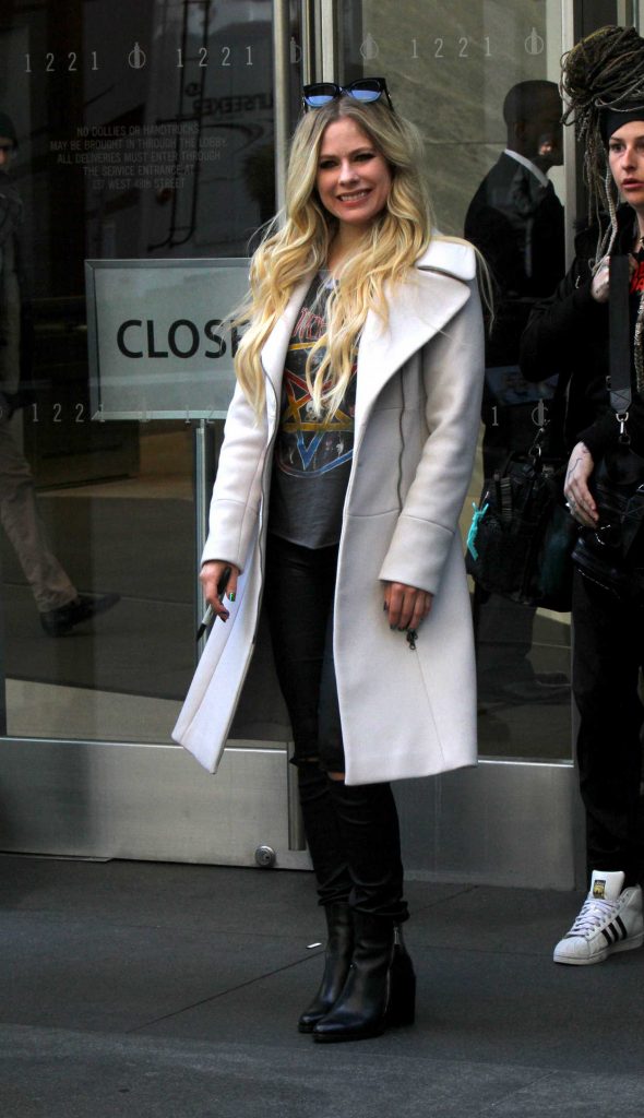 Avril Lavigne in a White Coat