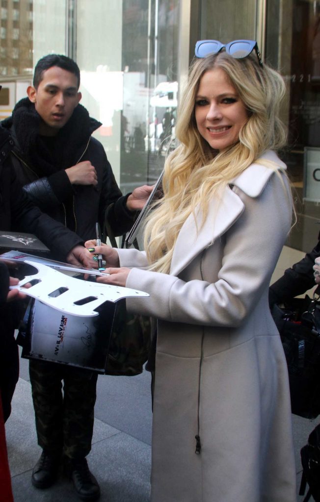 Avril Lavigne in a White Coat