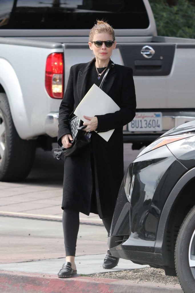 Kate Mara in a Black Coat