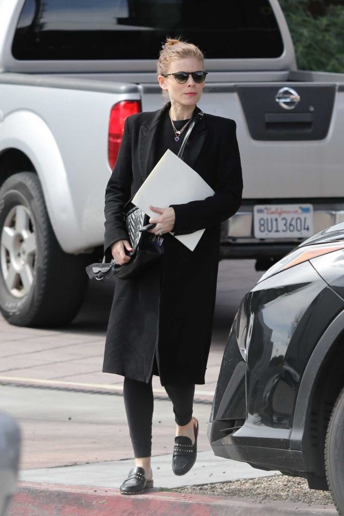 Kate Mara in a Black Coat