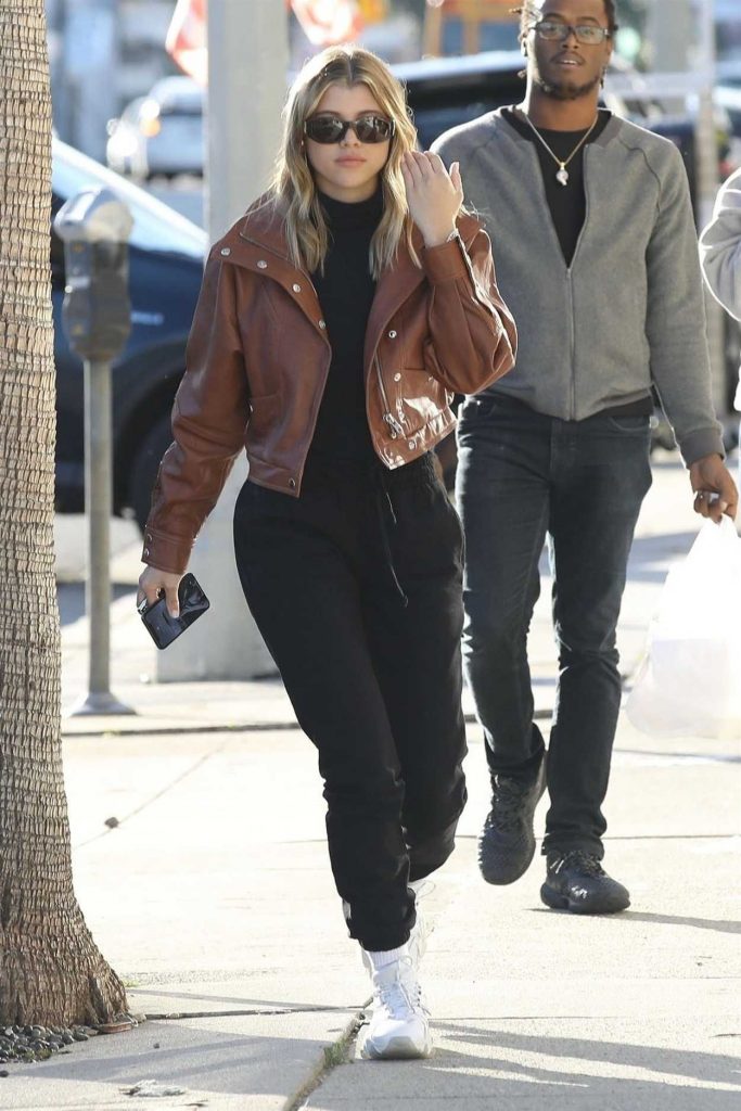 Sofia Richie in a Brown Leather Jacket