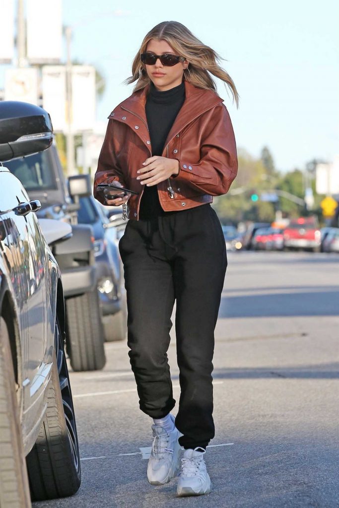 Sofia Richie in a Brown Leather Jacket