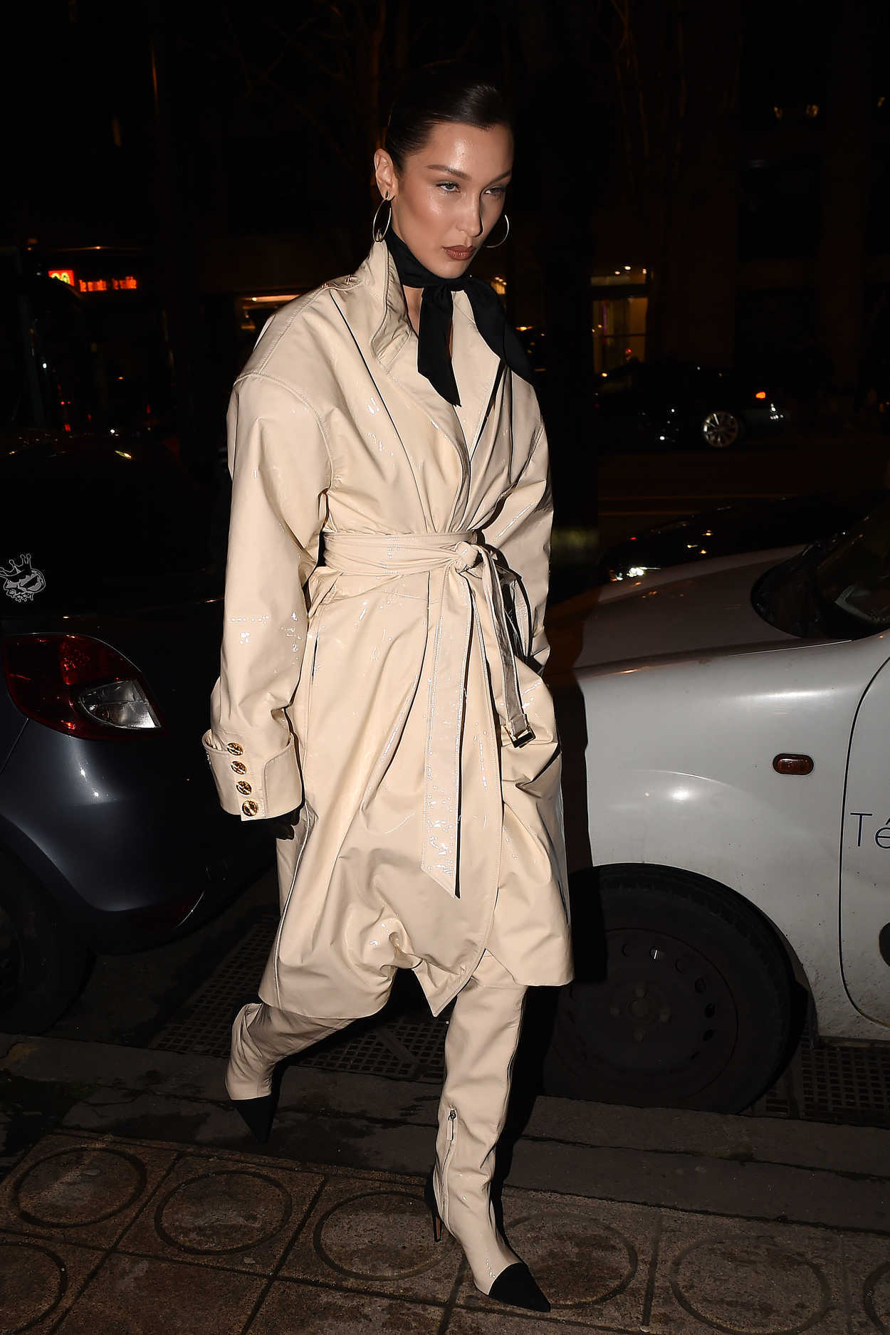 Bella Hadid in a Beige Trench Coat Goes to Louis Vuitton Party in Paris