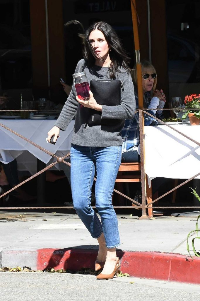 Courteney Cox in a Gray Sweater