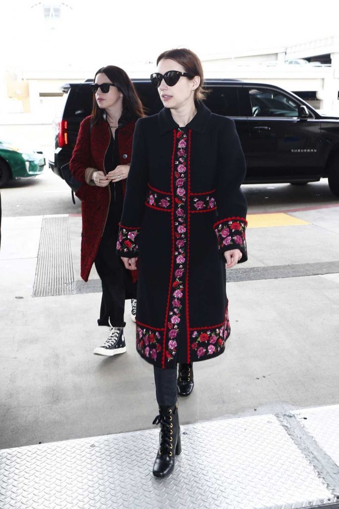 Emma Roberts in a Black Floral Print Coat