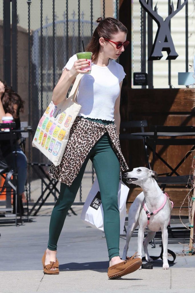 Emma Roberts in a Green Leggings