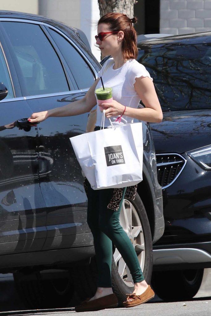 Emma Roberts in a Green Leggings