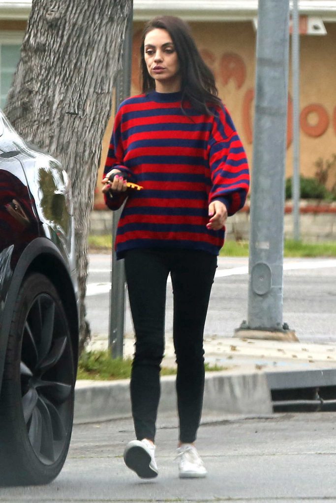Mila Kunis in a Striped Sweater
