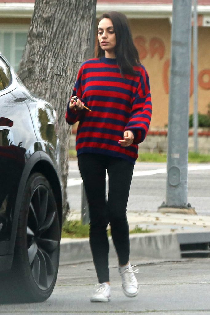 Mila Kunis in a Striped Sweater