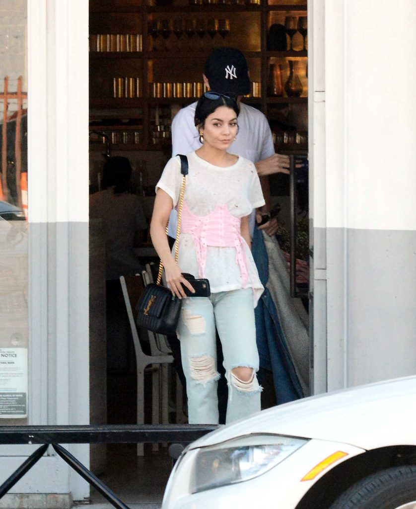 Vanessa Hudgens in a Blue Ripped Jeans